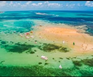 an aerial view of a beach in the ocean at Apartamento Completo Praia de Camboinha in Cabedelo