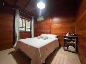 Un pat sau paturi într-o cameră la Cabana Exclusiva: Recarregue suas Energias