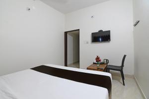 OYO Hotel Bijaya Premium tesisinde bir televizyon ve/veya eğlence merkezi