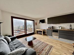 Η κουζίνα ή μικρή κουζίνα στο Studio cabine 4 pers avec balcon, près commerces et navette gratuite - FR-1-330F-230 +11 φωτογραφίες