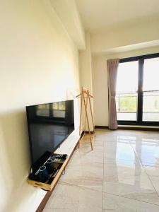 TV a/nebo společenská místnost v ubytování 倆倆民宿