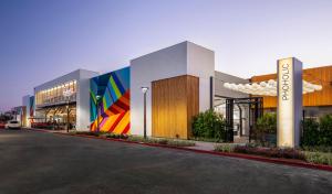 a row of buildings on a street at Charming Disneyland Retreat - Sleeps up to 12 w Game Room, Pool Table, EV w King Bed in Midway City