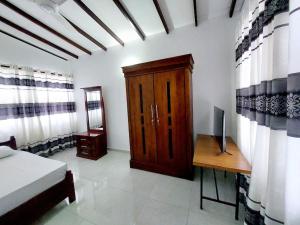 Postel nebo postele na pokoji v ubytování Comfortable Stay in Colombo