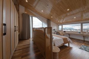 Rúm í herbergi á Jodi Dalat Hotel
