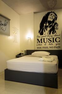 Letto o letti in una camera di GC Suites