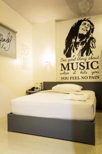 Letto o letti in una camera di GC Suites