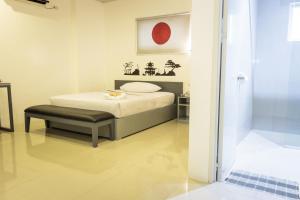 Letto o letti in una camera di GC Suites