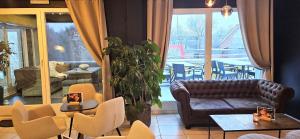 Area soggiorno di Hotel-Restaurant Stand'Inn