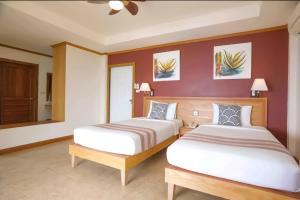 Letto o letti in una camera di Pinnacle Koh Tao Resort