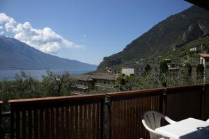 a balcony with a view of a lake and mountains at Residence Miravalle in Limone sul Garda