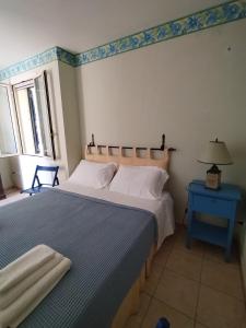 appartamento in pineta vista mare tesisinde bir odada yatak veya yataklar