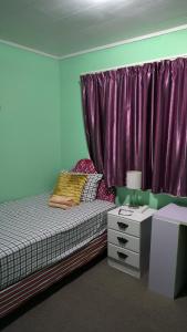 Łóżko lub łóżka w pokoju w obiekcie Wendy's Holiday Home