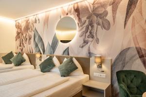 Postel nebo postele na pokoji v ubytování Hotel Lokomotive