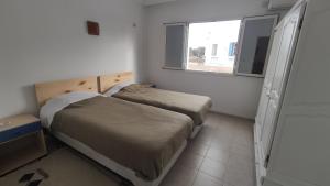 Postel nebo postele na pokoji v ubytování CoZi Coliving Djerba