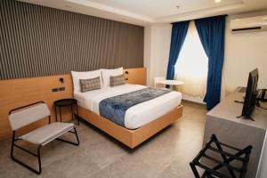 Postel nebo postele na pokoji v ubytování Casa Veles Hotel + 20 fotografií