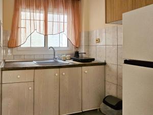 Kuchyň nebo kuchyňský kout v ubytování Chariclia Hotel