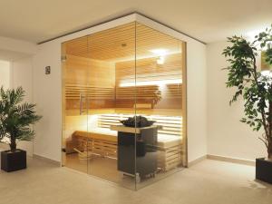 a room with a glass shower with a counter at Ferienwohnung-Am-Wurmberg-1 in Braunlage