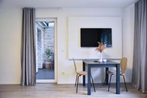 Μια τηλεόραση ή/και κέντρο ψυχαγωγίας στο Top Wohnung in Refrath bei Köln