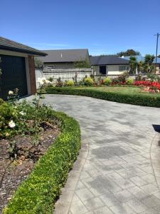 a driveway in front of a house at City haven in Whanganui