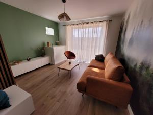 Posezení v ubytování L'Alambic à Martial