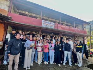 a group of people standing in front of a building at Panchase Family Homestay in Kāskī