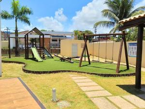 Kawasan permainan kanak-kanak di Apartamento aconchegante em condomínio perto da praia