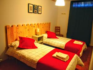 A bed or beds in a room at Las Colmenillas 1