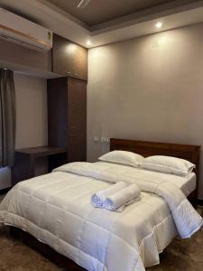 Posteľ alebo postele v izbe v ubytovaní GK Homestays - Luxurious Furnished Apartment