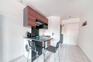 Una cocina o cocineta en Atelier-Gerland