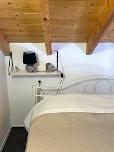 Ένα ή περισσότερα κρεβάτια σε δωμάτιο στο Casa Di Rosse