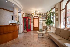 Гостиная зона в Lola Piccolo Hotel e Appartamenti