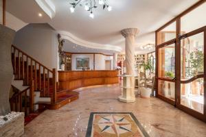 Фотография из галереи Lola Piccolo Hotel e Appartamenti в Марина-ди-Гроссето