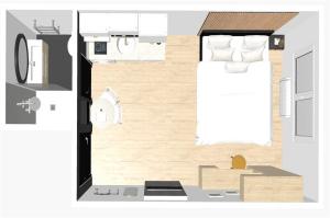 Grundriss eines Schlafzimmers mit einem Bett in der Unterkunft Blackwood-parking privé gratuit in Villeurbanne