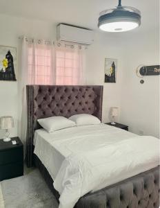 A bed or beds in a room at Residencial García 1 apt 3