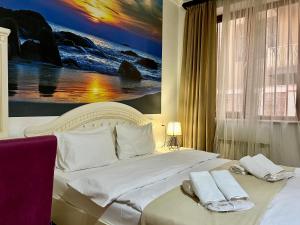 Giường trong phòng chung tại Family Hotel