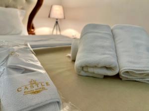 Giường trong phòng chung tại Family Hotel