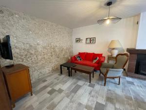 TV a/nebo společenská místnost v ubytování La Maison de Marion