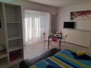 Postel nebo postele na pokoji v ubytování Appartamento Elisabetta