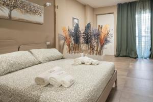 Postel nebo postele na pokoji v ubytování le stanze di via veneto
