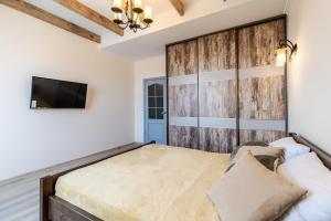 Posteľ alebo postele v izbe v ubytovaní InshiApartments on Hazova str 4