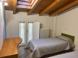 Postel nebo postele na pokoji v ubytování Appartamento nel cuore di Vigevano