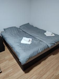 Postel nebo postele na pokoji v ubytování Apartmani Hub