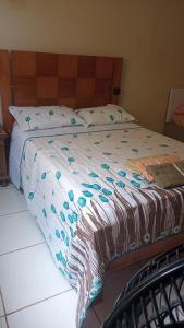 Ein Bett oder Betten in einem Zimmer der Unterkunft Casa familiar