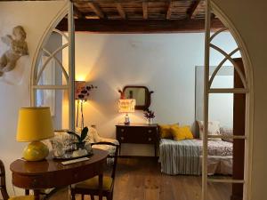 A bed or beds in a room at B&B Alla Corte dei Medici