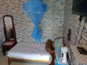 Postel nebo postele na pokoji v ubytování Secret View Homestay Ella