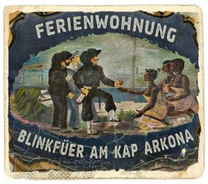 a sign with a painting of a group of people at Blinkfüer am Kap Arkona in Putgarten