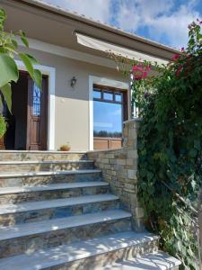 a set of stairs in front of a house at The Villea Cottage - 5 bed house in Alli Meria in Álli Meriá