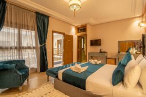 Postel nebo postele na pokoji v ubytování Riad Azia + 37 fotografií