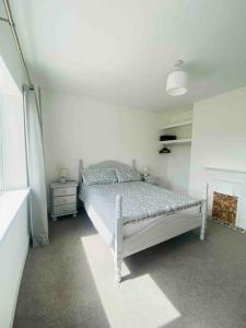 Voodi või voodid majutusasutuse The Townhouse Dungloe toas