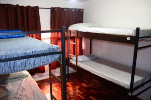 a room with two bunk beds in a room at Hostel FreeWay in Brasilia